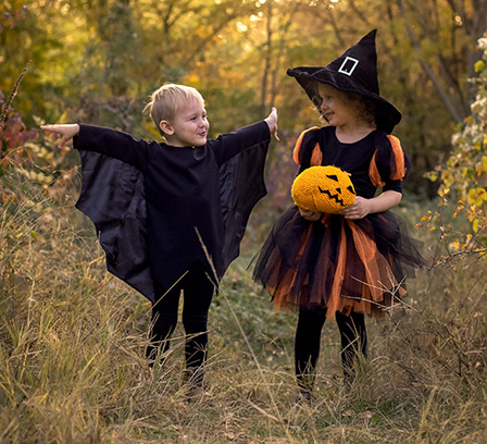 Two kids dressed up for Halloween